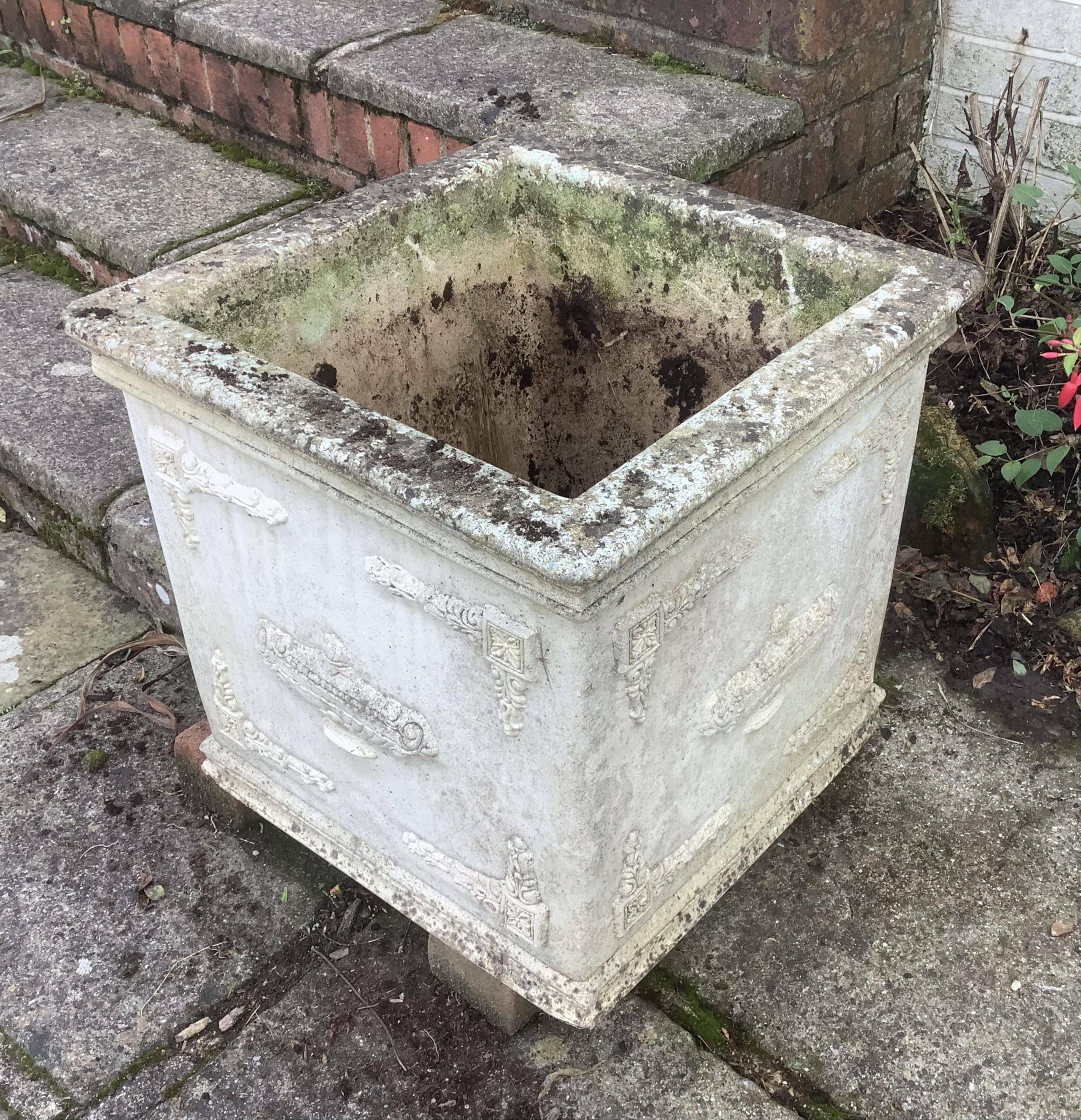 A pair of square reconstituted stone planters, height 50cm, width 50cm. planting removed, Condition - weathered, otherwise good